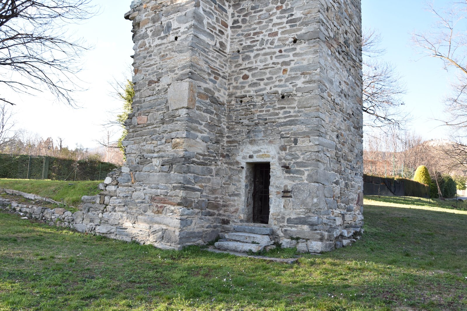 Torre di Velate — a ruined medieval watchtower of two standing stone walls above Varese, Lombardy