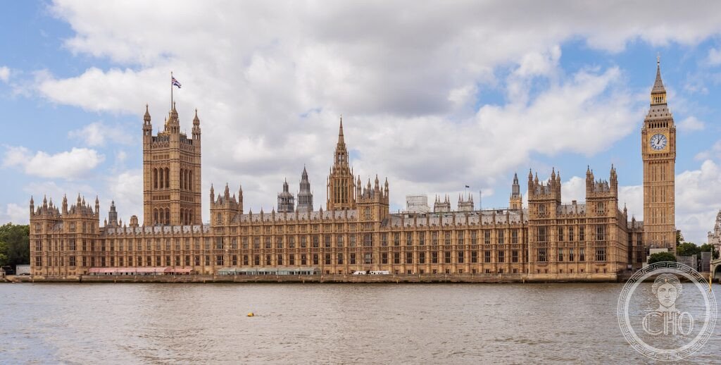 The Houses of Parliament and the Big Ben clock tower along the River Thames in London