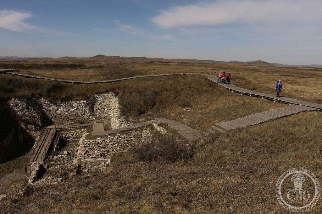 Grass-covered ruins and earthworks of the Site of Xanadu on the Mongolian steppe