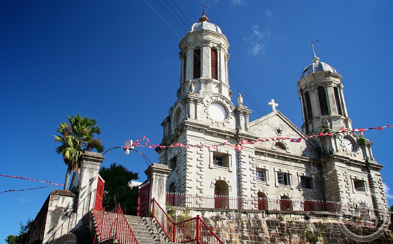 Cathedral of St John the Divine in St. John's, Antigua, its twin Baroque towers and pitch-pine-clad interior built 1845-1848 as a 'building within a building' to survive earthquakes and hurricanes