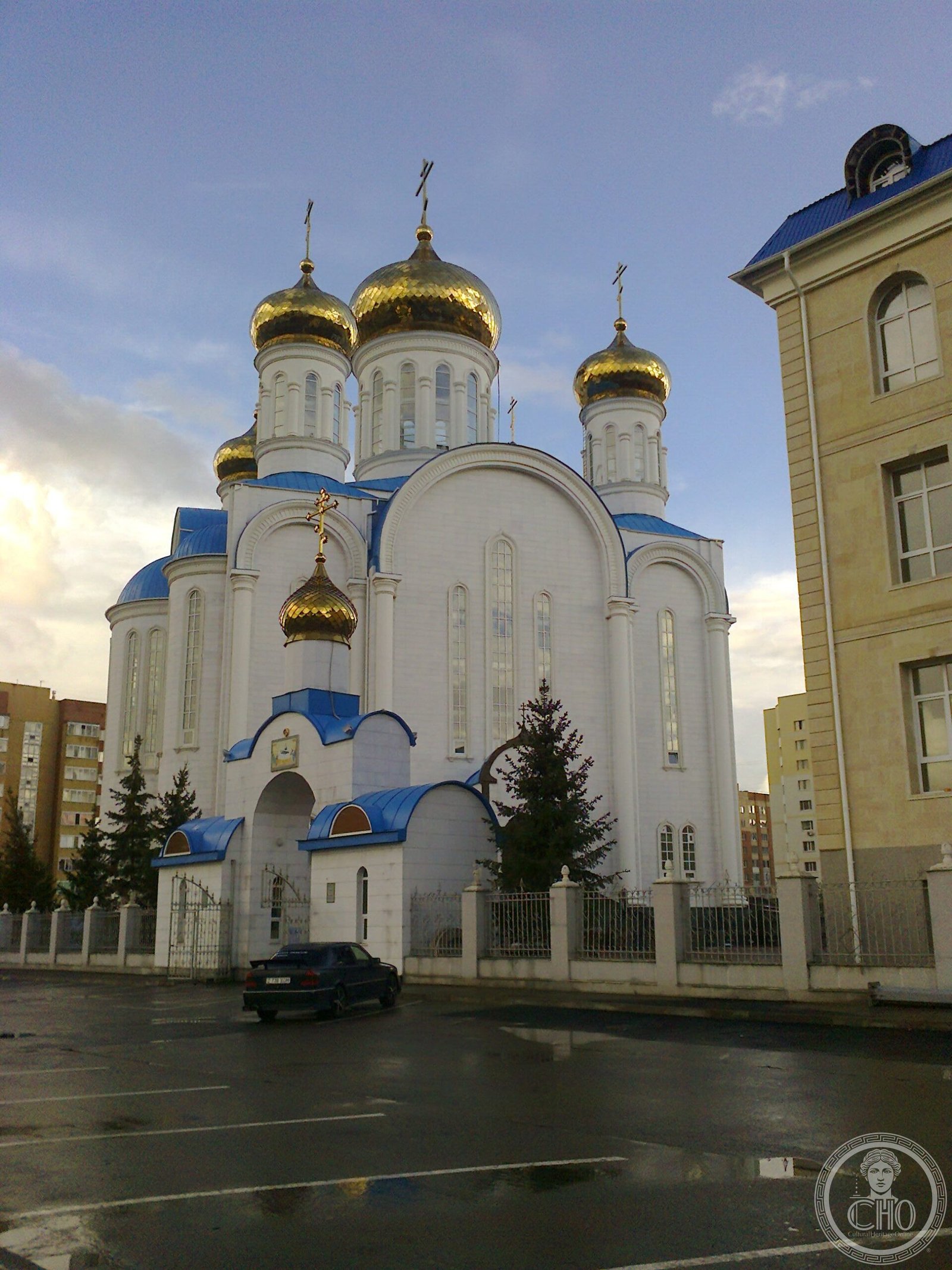 Assumption Cathedral in Astana, Kazakhstan, a white Russian Orthodox cathedral with gold onion domes, built 2006-2010