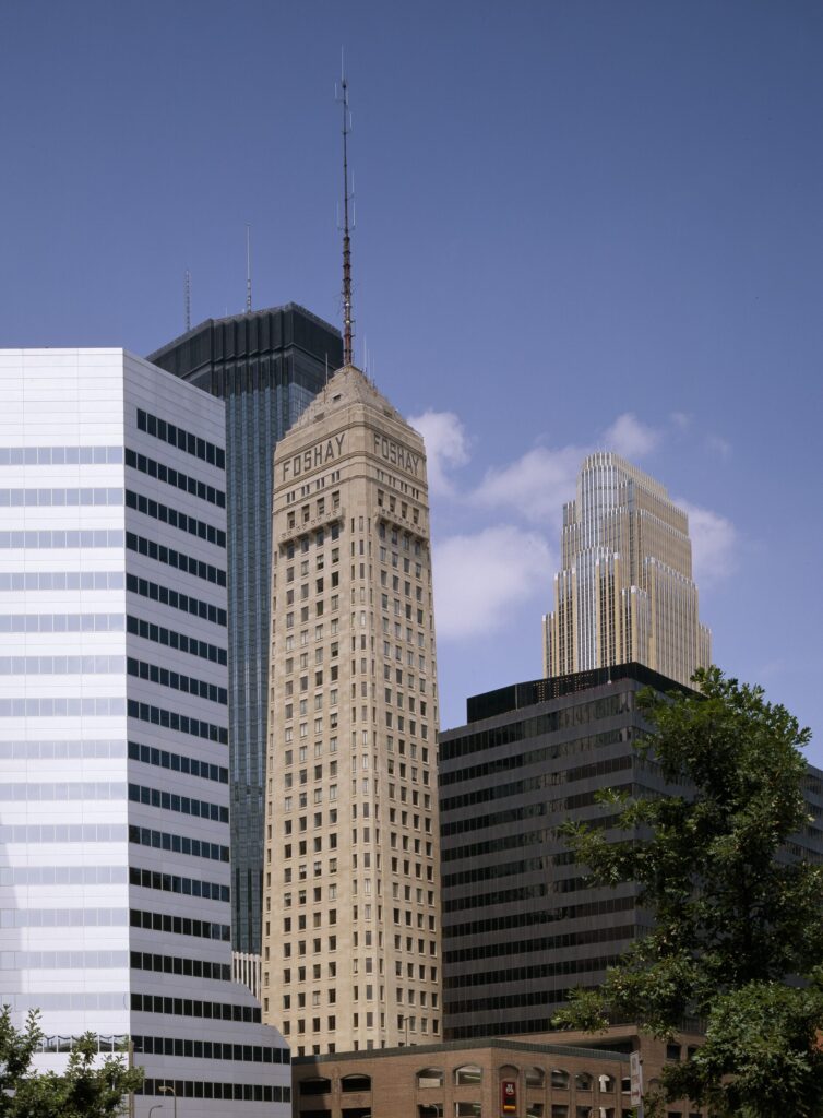 The Foshay Tower rising between modern towers in downtown Minneapolis