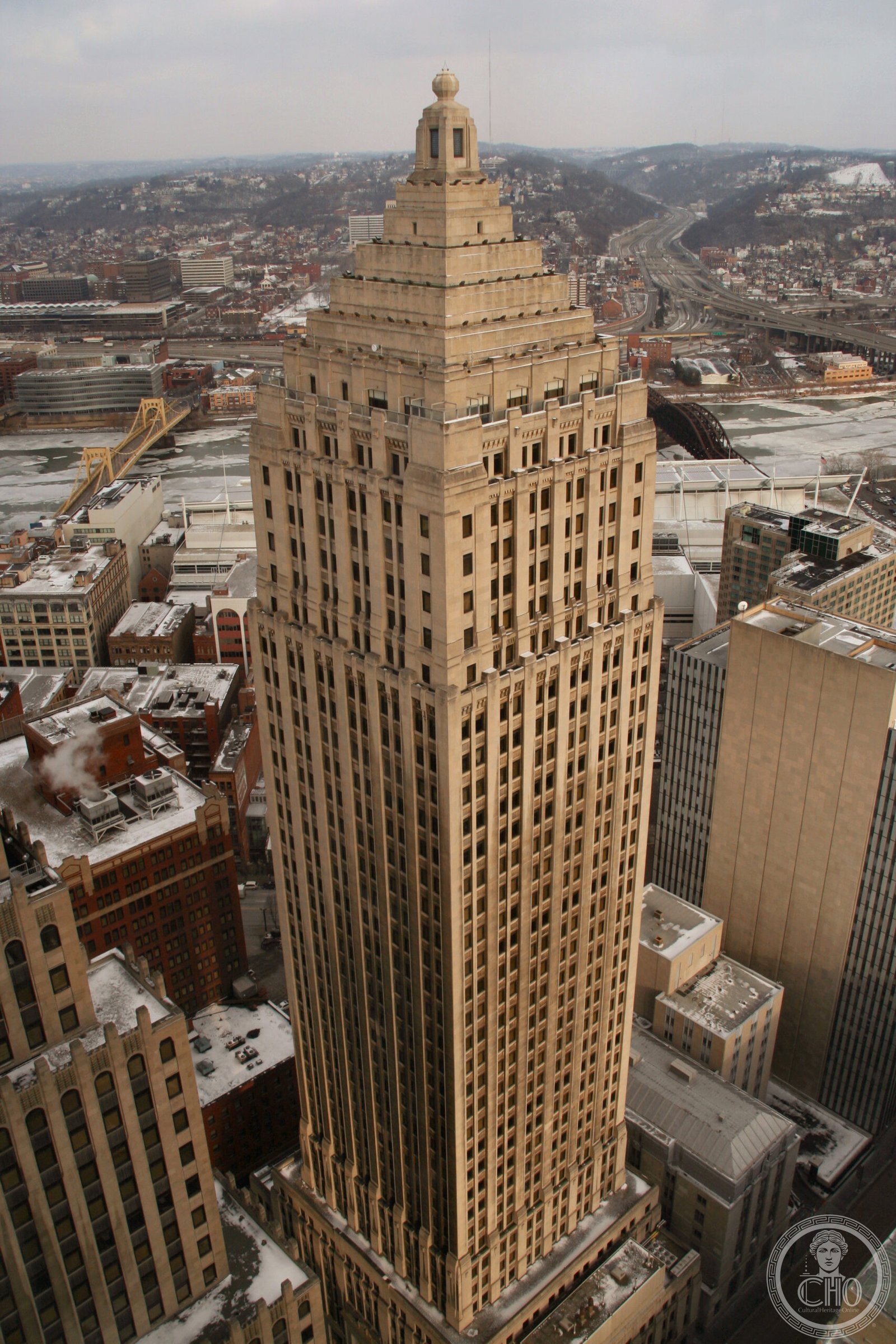 Gulf Tower Gothic Art Deco skyscraper with illuminated stepped crown rising above Grant Street in downtown Pittsburgh