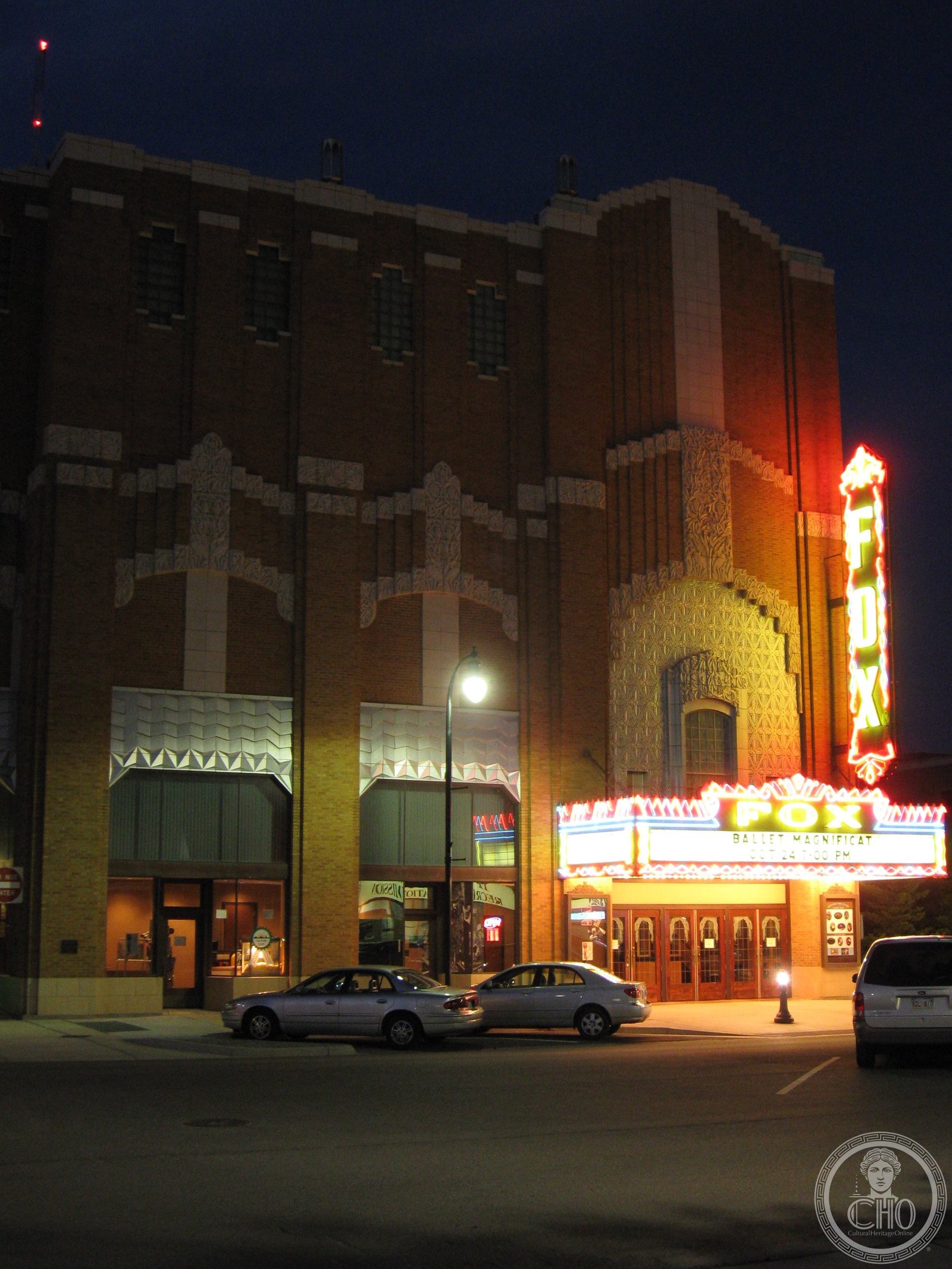 Fox Theater lit at night with neon marquee on First Avenue, Hutchinson, Kansas