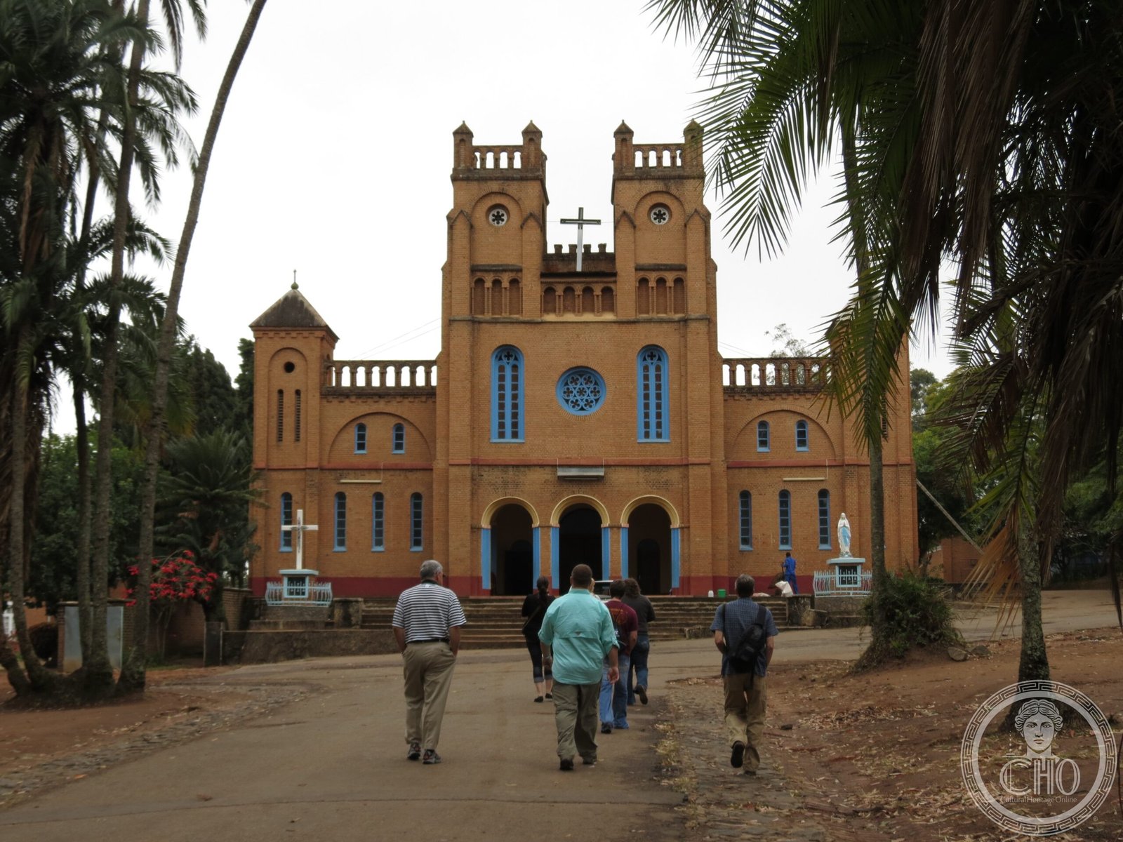 Our Lady of Wisdom Cathedral in Limbe, Blantyre, Malawi, a brick Romanesque facade with twin bell towers and a rose window