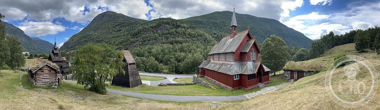 Borgund Stave Church in Lærdal, Norway, built c. 1180-1250 using Viking shipbuilding techniques, the best-preserved of Norway's surviving stave churches, alongside its bell tower and the 1868 replacement church