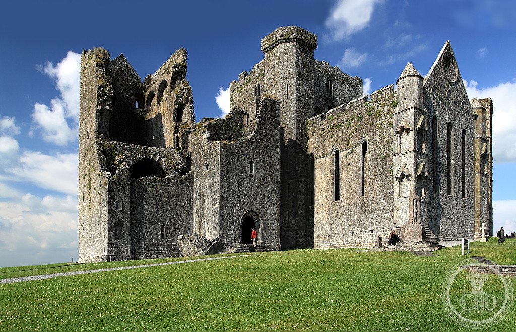 The Rock of Cashel in Ireland, traditional seat of the Kings of Munster since the 4th century, where Saint Patrick reportedly converted King Aengus, accidentally piercing his foot with a crozier, and where Cormac's Chapel preserves Ireland's only surviving Romanesque frescoes