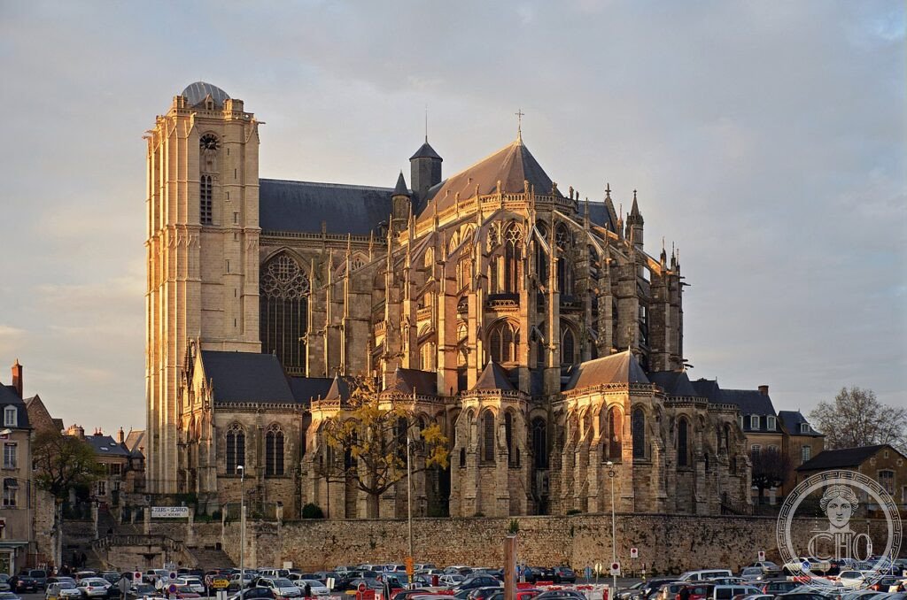 Exterior of Le Mans Cathedral (Cathédrale Saint-Julien), Pays de la Loire, France, whose Romanesque nave and Gothic choir sit side by side, with a stained-glass Ascension window from around 1120