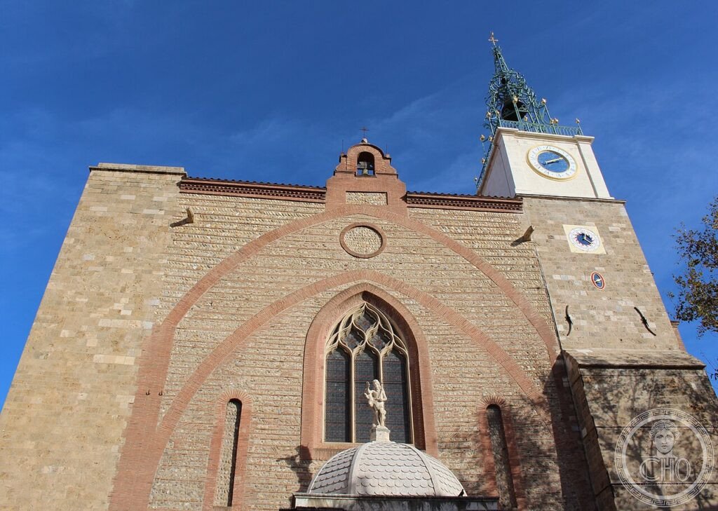 Facade of Perpignan Cathedral (Cathédrale Saint-Jean-Baptiste), Occitanie, France, begun 1324 by King Sanç of Majorca, redesigned as a single wide nave by Guillem Sagrera and completed 1509