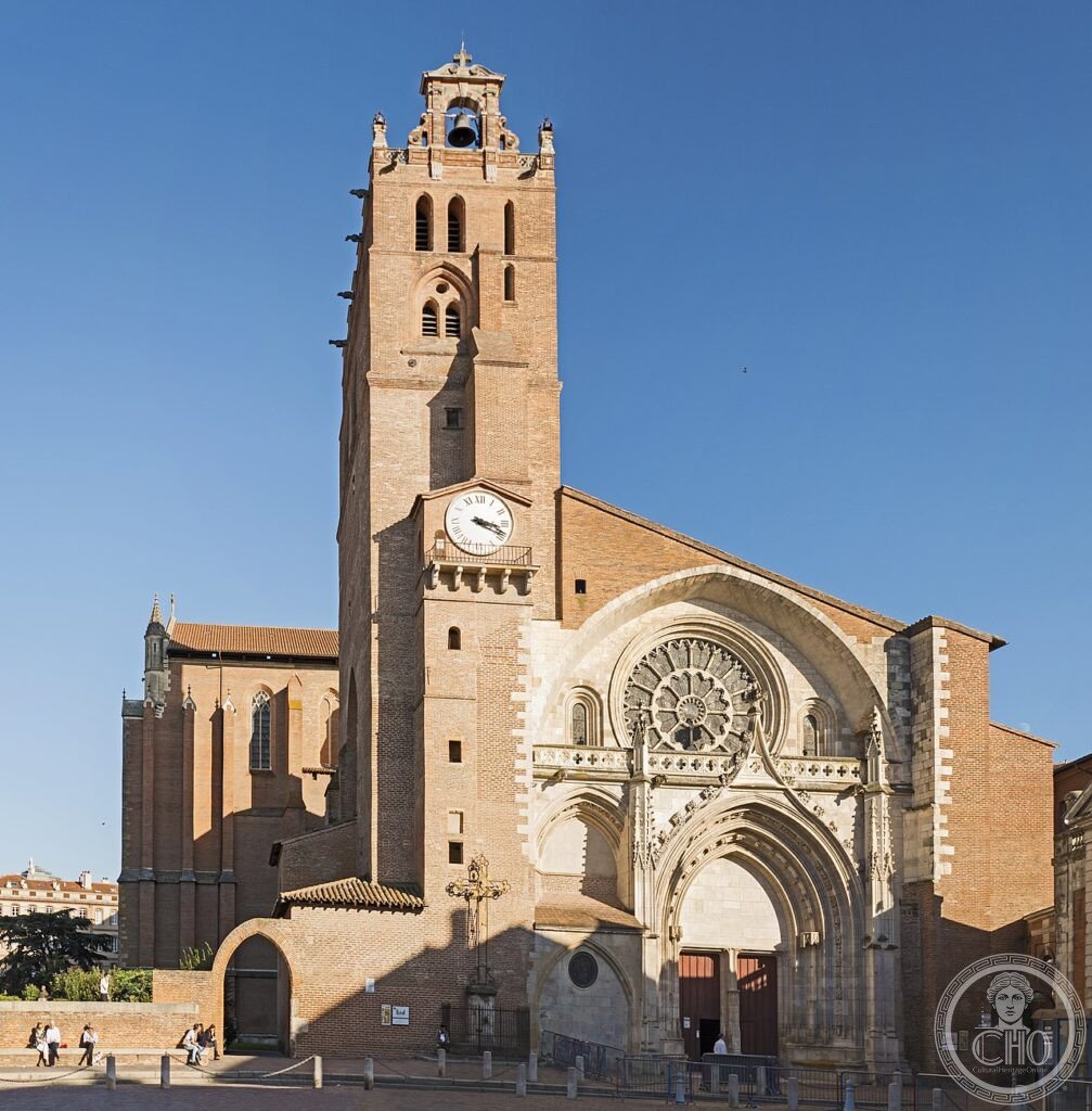 Facade of Toulouse Cathedral (Cathédrale Saint-Étienne), Occitanie, France, whose choir and nave stand at a visible angle to each other, a hallmark of the building's incomplete medieval construction