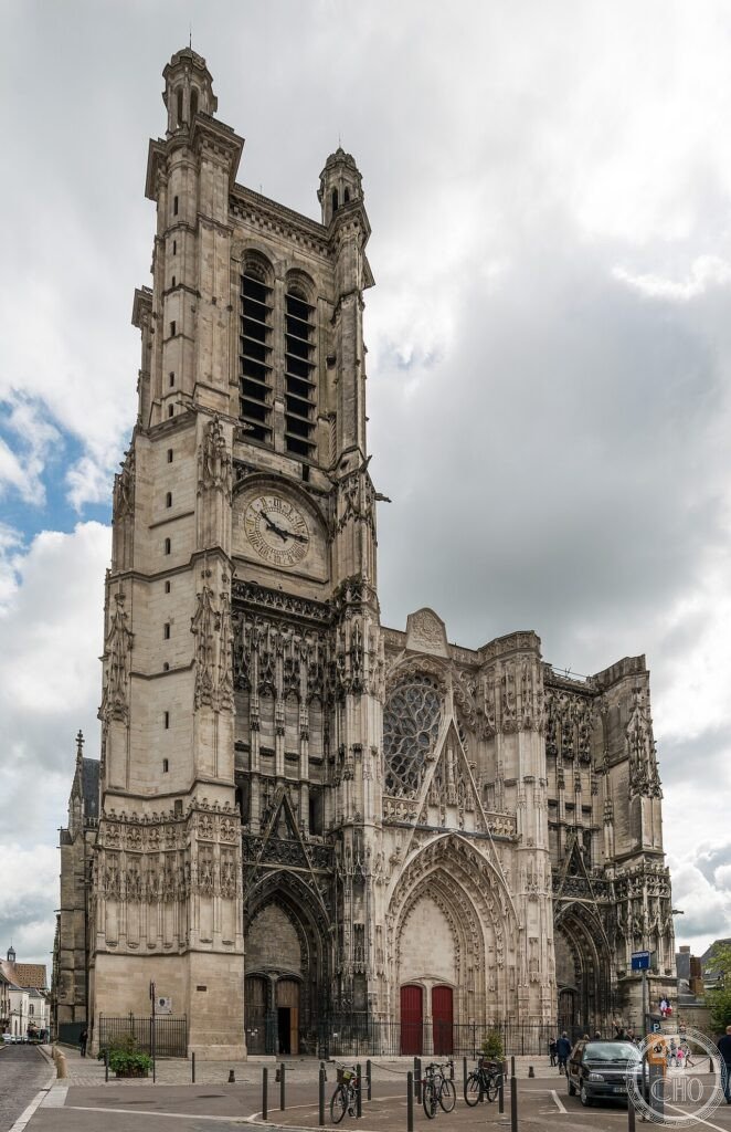West facade of Troyes Cathedral (Cathédrale Saint-Pierre-et-Saint-Paul), Champagne, France, with its three Flamboyant Gothic portals by Martin Chambiges, and 1,500 square metres of stained glass