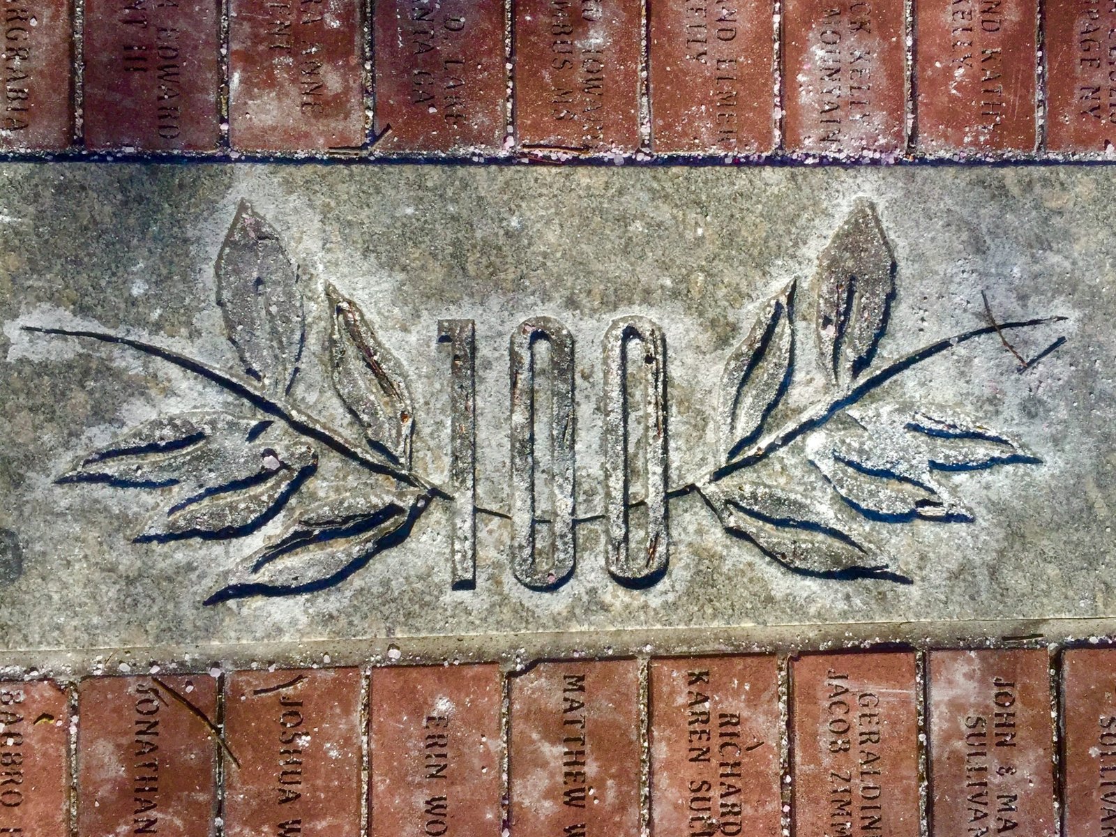 A brick marking the centennial of the modern Games.
