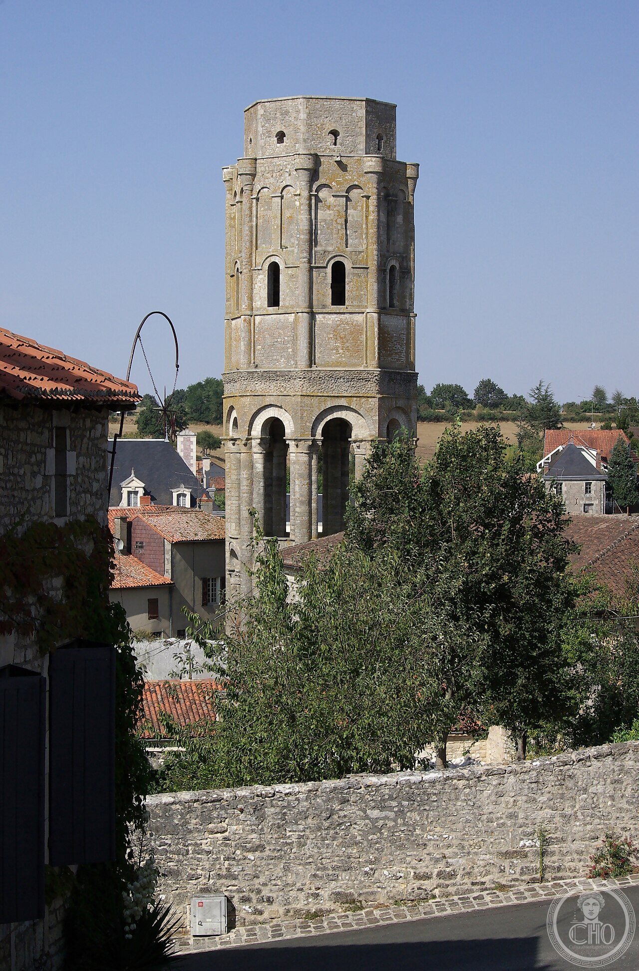 Tour Charlemagne, the 11th-century octagonal lantern tower of Charroux Abbey, France, founded 785, once said to hold a relic given by Charlemagne so controversial the Church banned all discussion of it in 1900