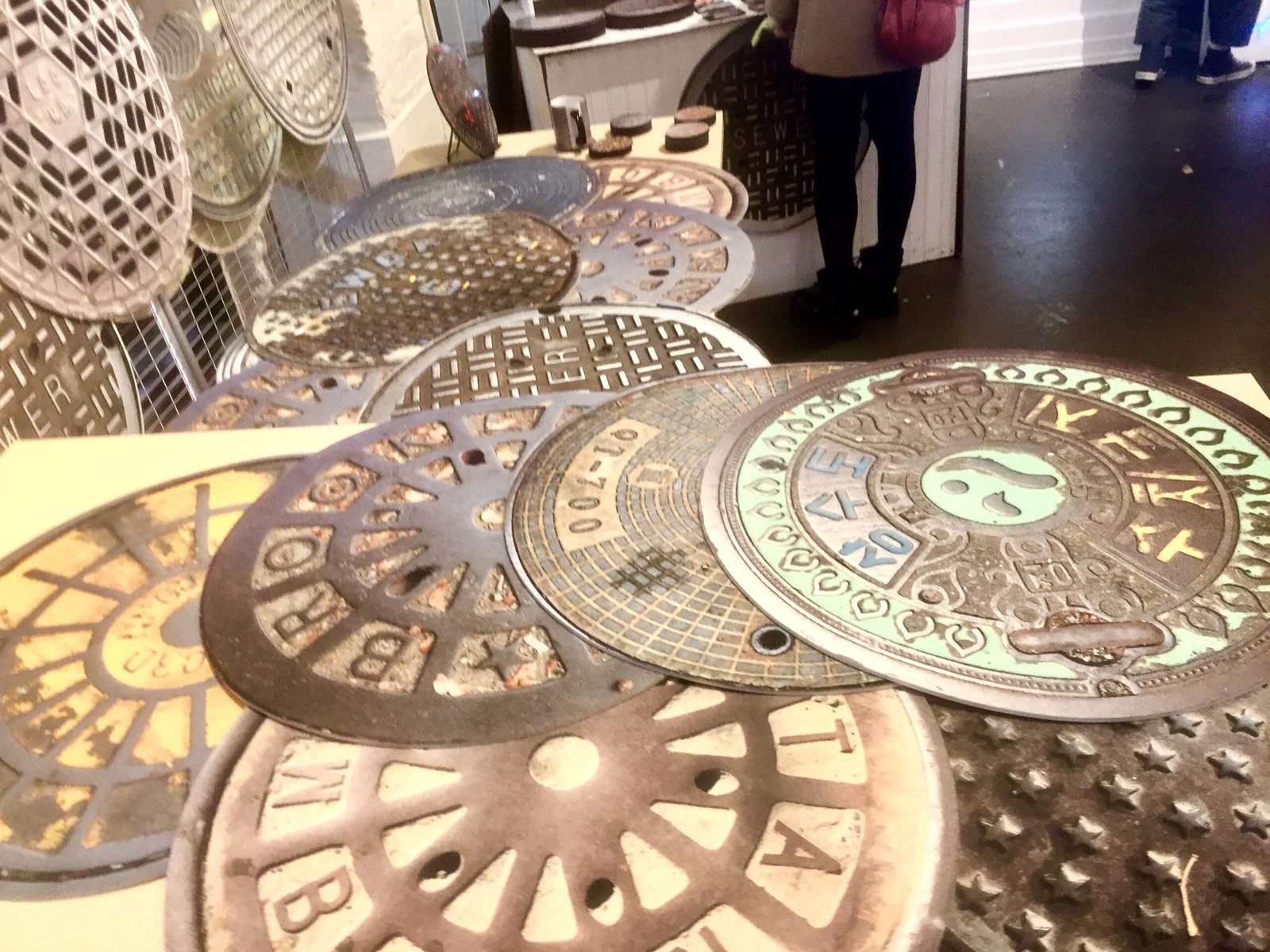 Decorative bronze medallions on display.