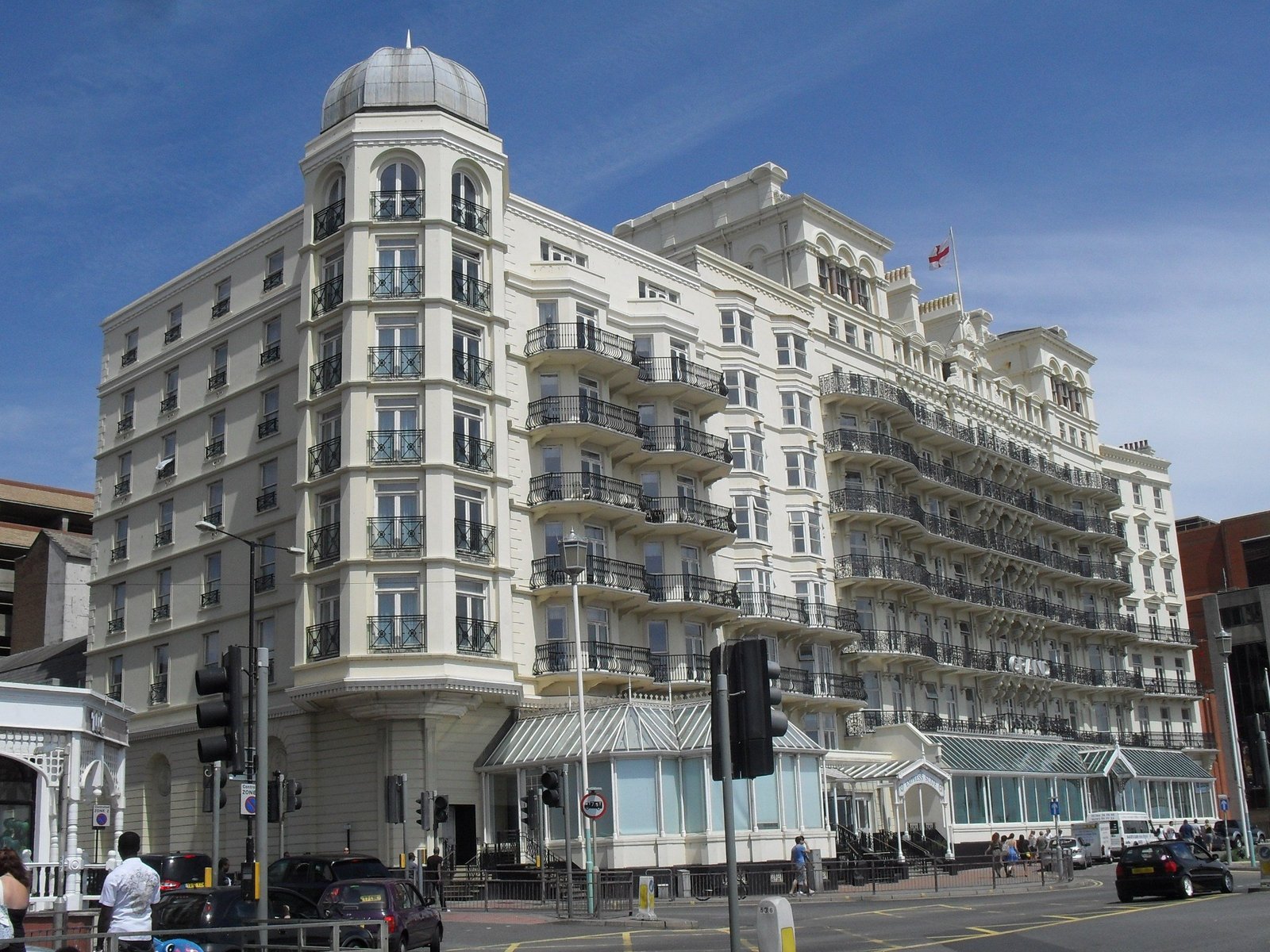 The Grand Brighton's white Italianate seafront facade seen from King's Road