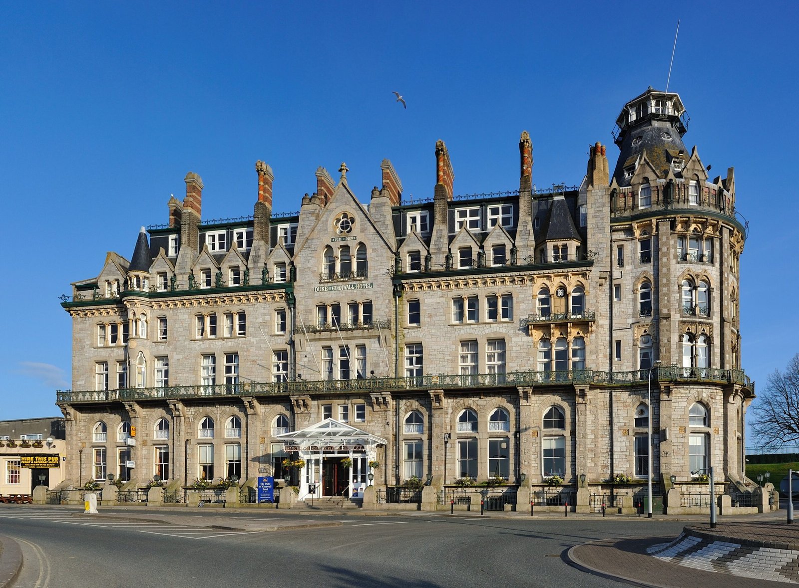 The Victorian Gothic Duke of Cornwall Hotel in Plymouth, its pointed gables and tower rising over Millbay Road
