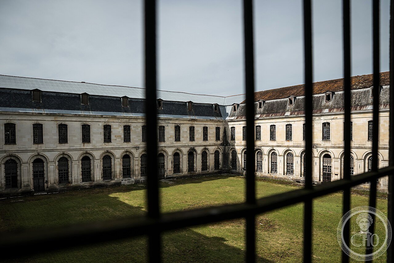 The great cloister of Clairvaux Abbey, France, founded 1115 by Bernard of Clairvaux, which grew to 700 monks and founded over sixty daughter houses, later used as a state prison from 1808 until its final closure in 2023