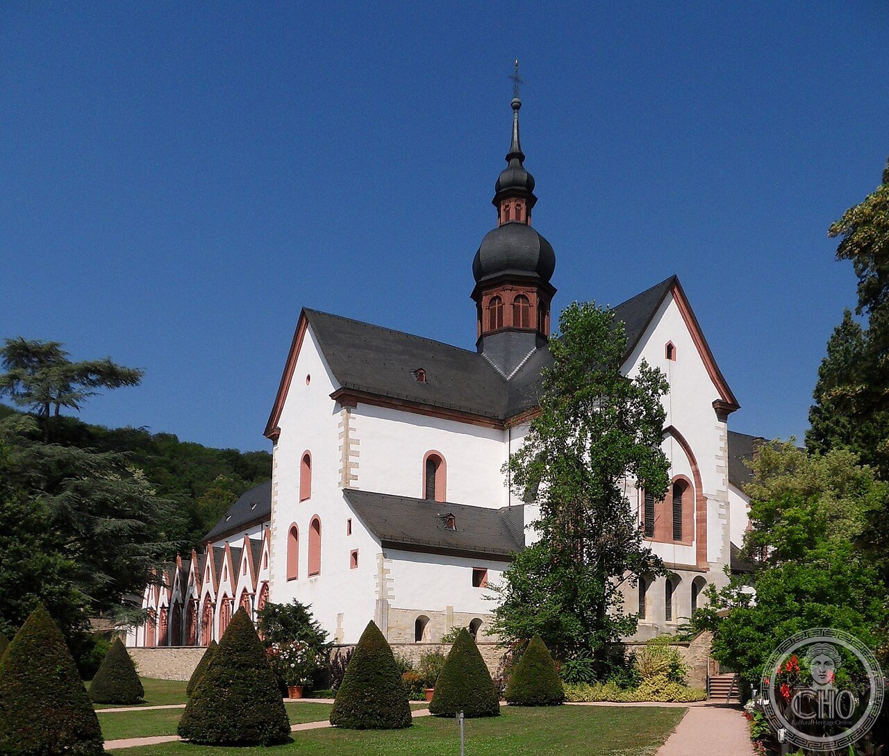Southeastern exterior view of the Romanesque basilica at Eberbach Abbey, Rheingau, Germany, founded 1136, where the German wine term Kabinett originated and where The Name of the Rose was filmed in 1986