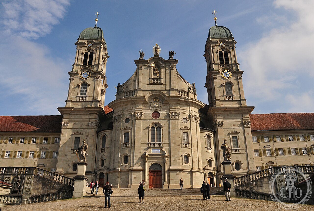 Einsiedeln Abbey, Switzerland, a Benedictine monastery built on the site of the hermit Meinrad's 9th-century hermitage, holding the Black Madonna, a mid-15th-century Gothic statue drawing 800,000 pilgrims annually