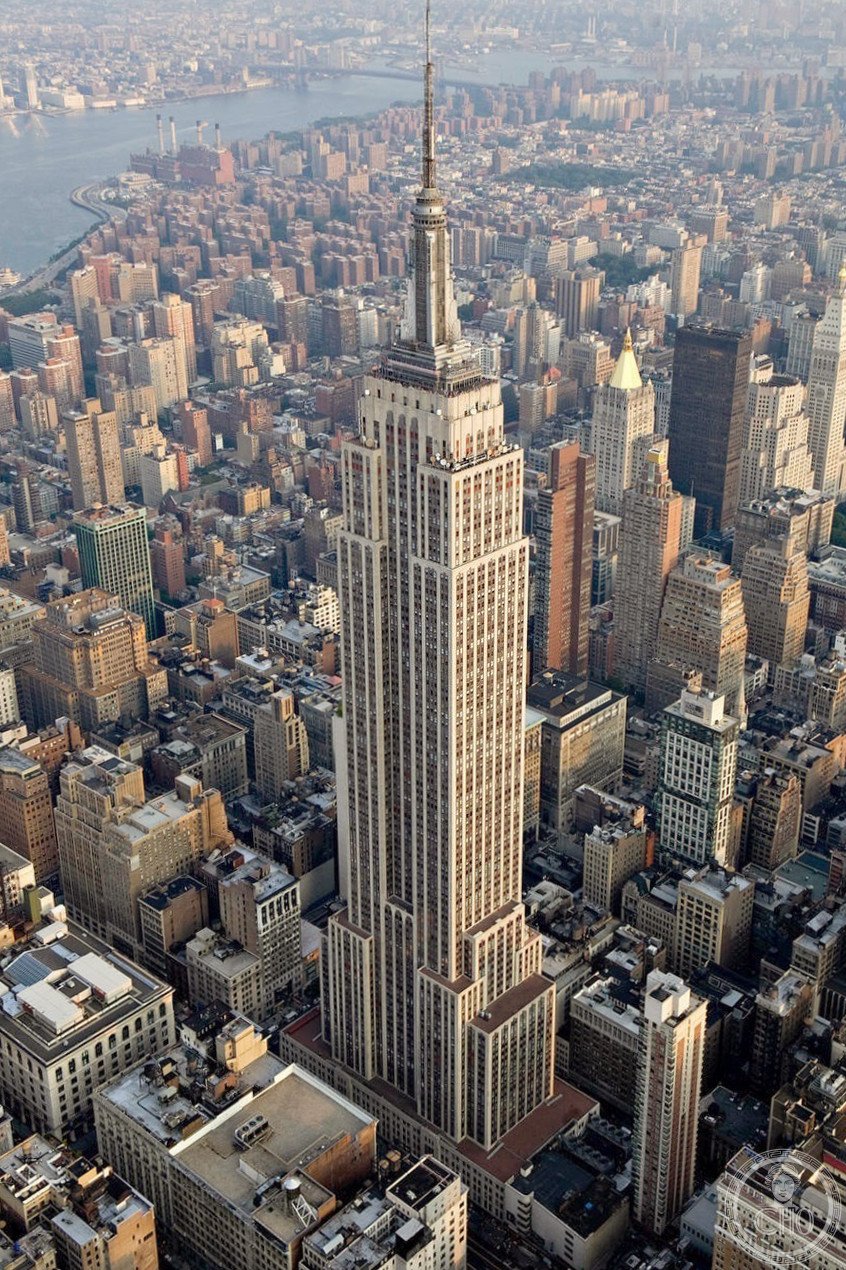 Empire State Building aerial view above Midtown Manhattan, New York City — Art Deco skyscraper 1931, 102 floors, Shreve Lamb and Harmon architects