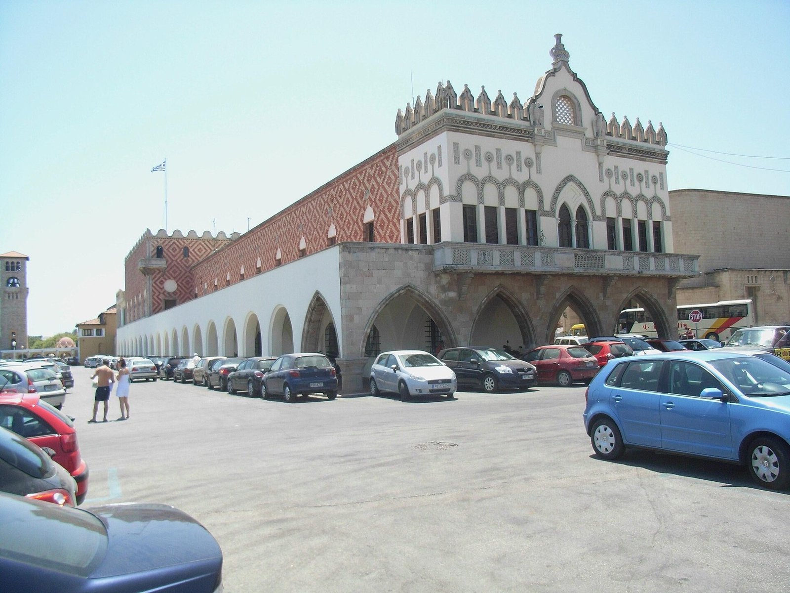 The Venetian-Gothic Governor's Palace of Rhodes, with pointed-arch loggia and diamond-patterned facade
