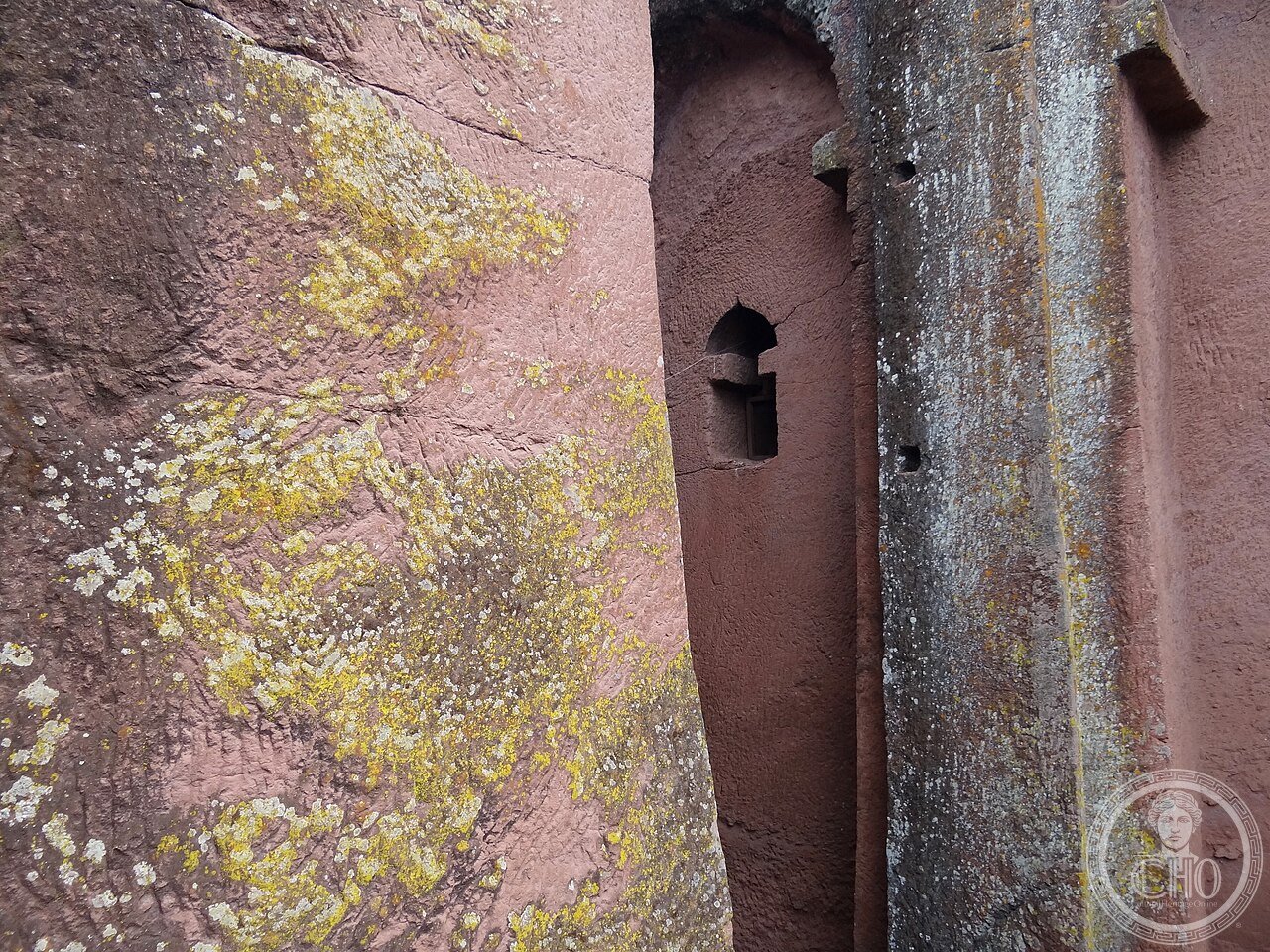 Bete Gabriel-Rufael in Lalibela, Ethiopia, a fortress-like rock-hewn church reached across a deep trench, believed by some scholars to have originally been a defensive royal complex predating King Lalibela's church-building programme