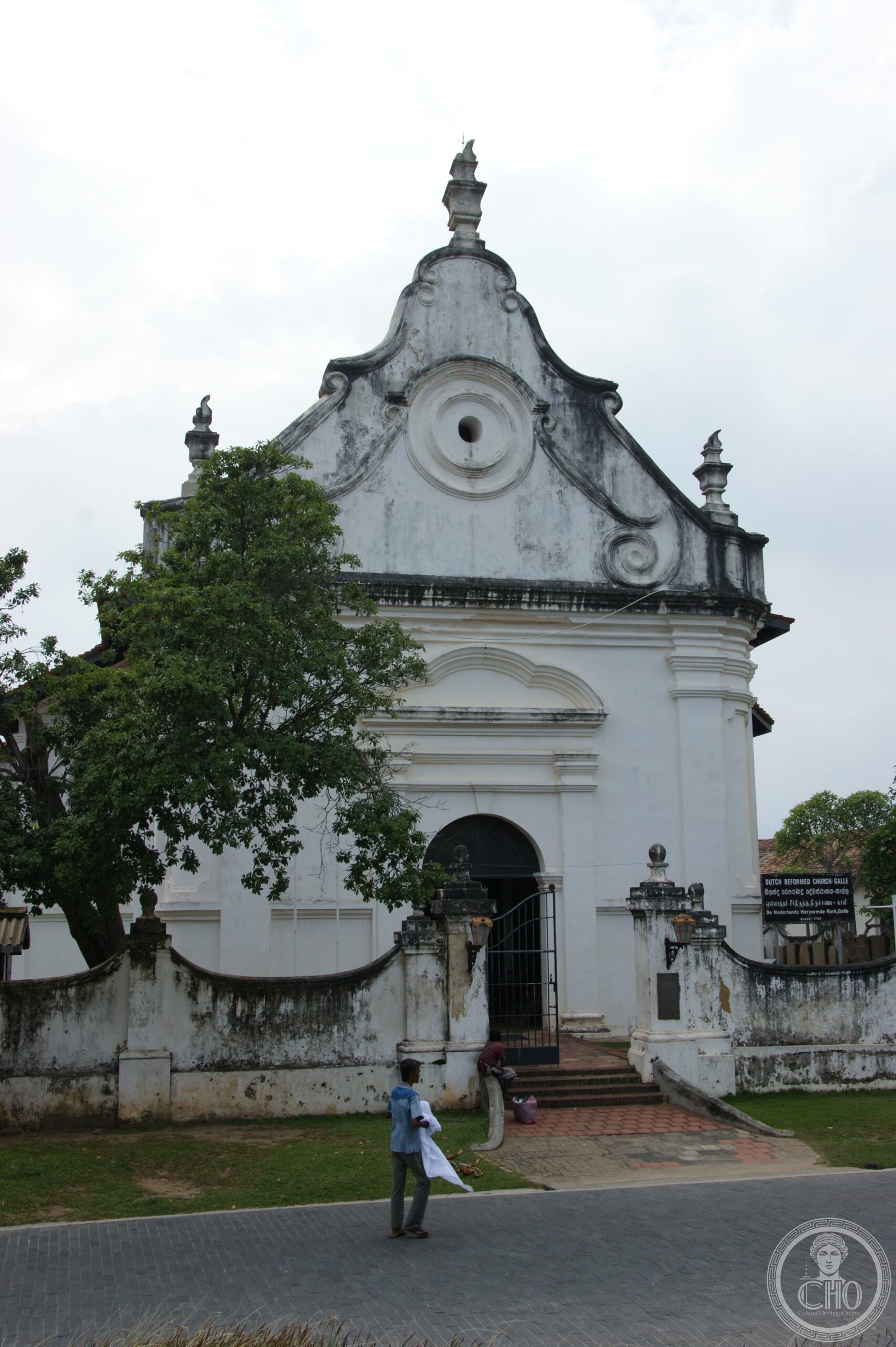 Groote Kerk, the Dutch Reformed Church inside Galle Fort, Sri Lanka, a whitewashed church with a curved Dutch gable and oculus window