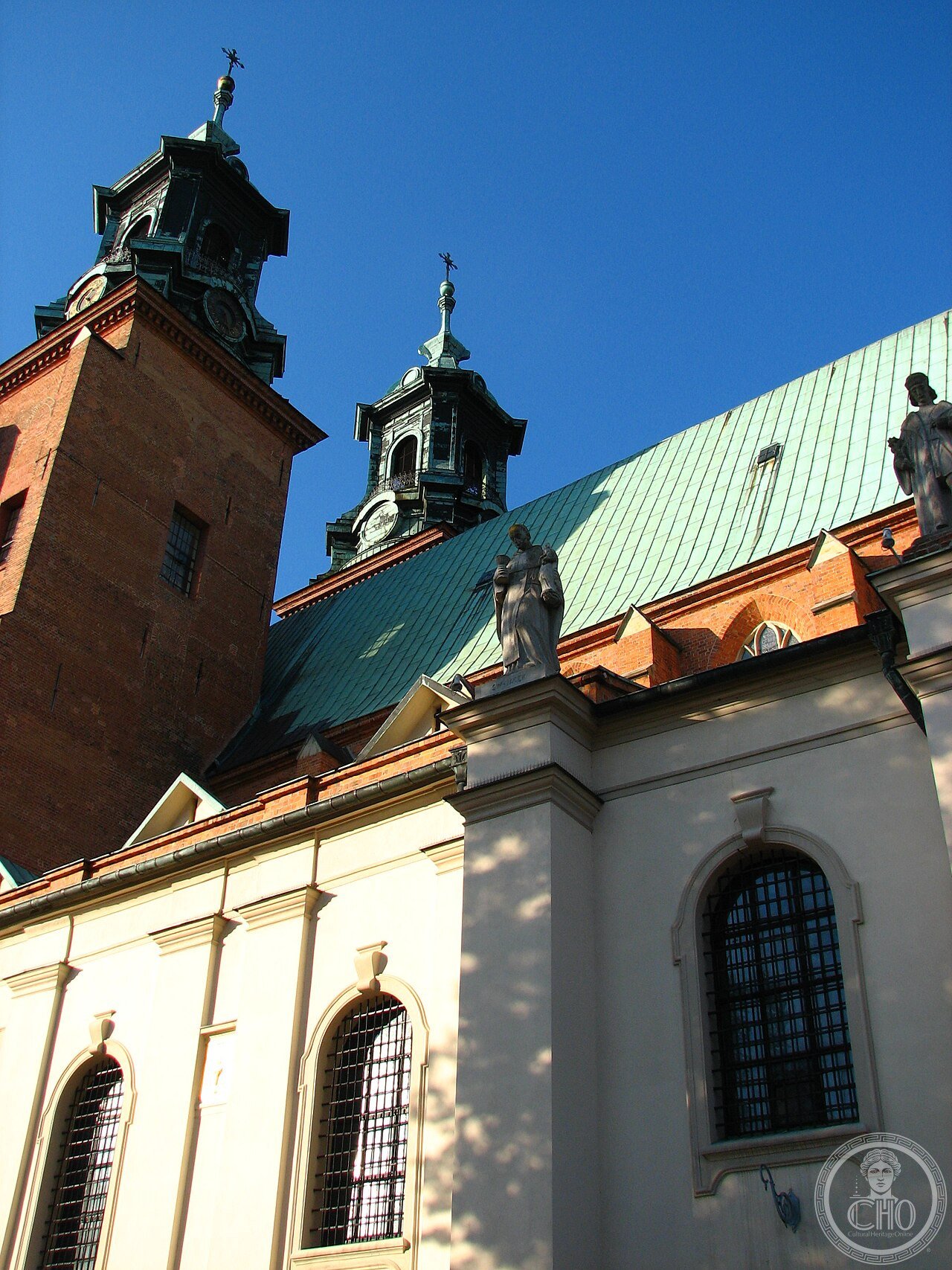 Exterior of Gniezno Cathedral, Poland, founded before 977, where Emperor Otto III's pilgrimage in March 1000 helped establish Poland's ecclesiastical independence and where Polish kings were crowned
