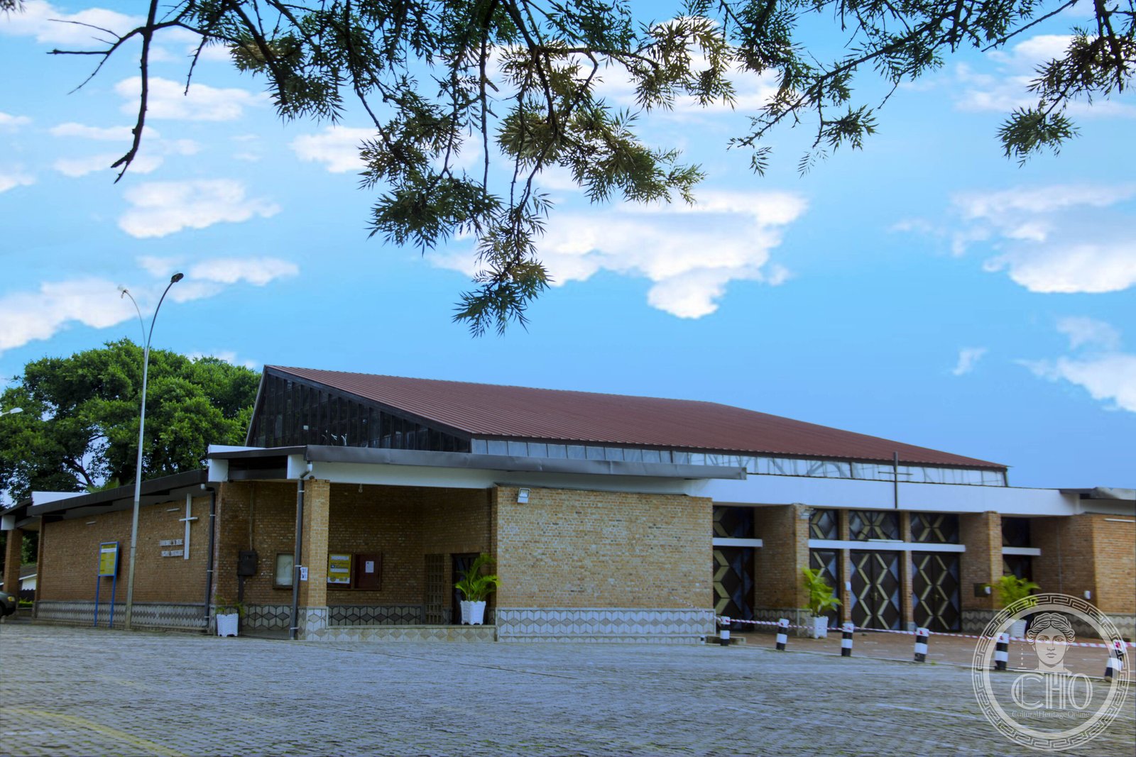 St. Michael's Cathedral in the Kiyovu neighborhood of Kigali, Rwanda, a modern brick building with a slanted glazed clerestory roof