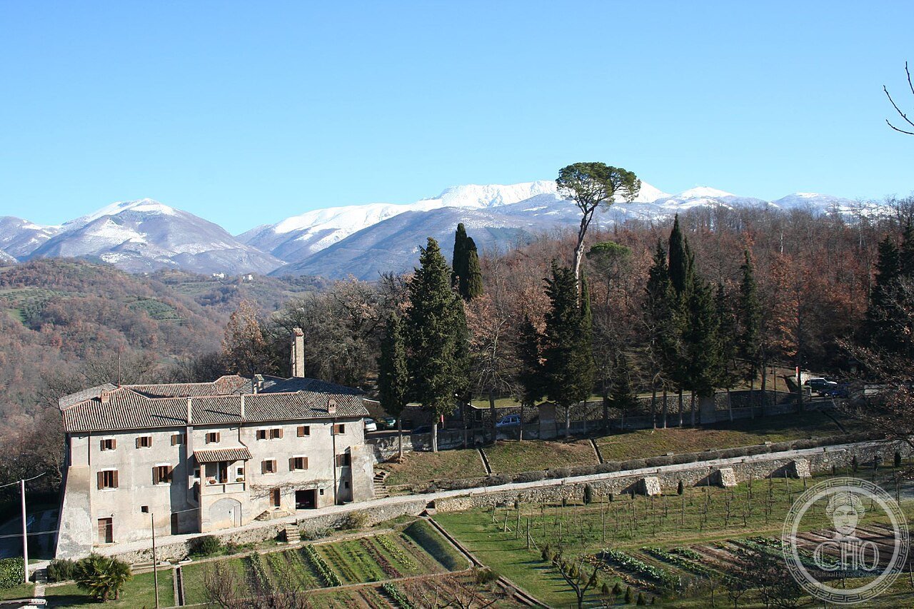 Exterior of the Sanctuary of La Foresta near Rieti, Italy, with Mount Terminillo in the background, where Saint Francis stayed for over fifty days in 1225 and reportedly performed the miracle of the grapes