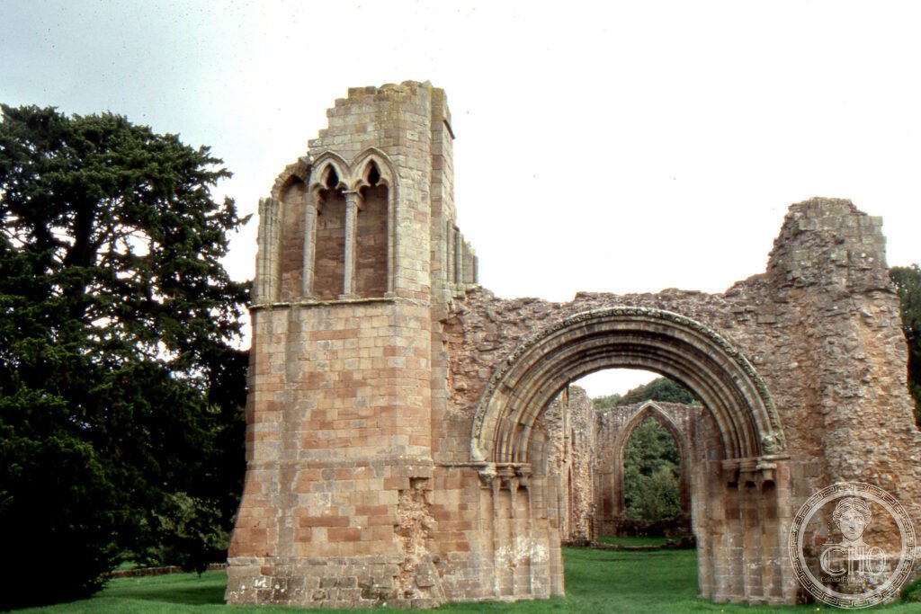 Ruined stone west front and lancet windows of Lilleshall Abbey in Shropshire