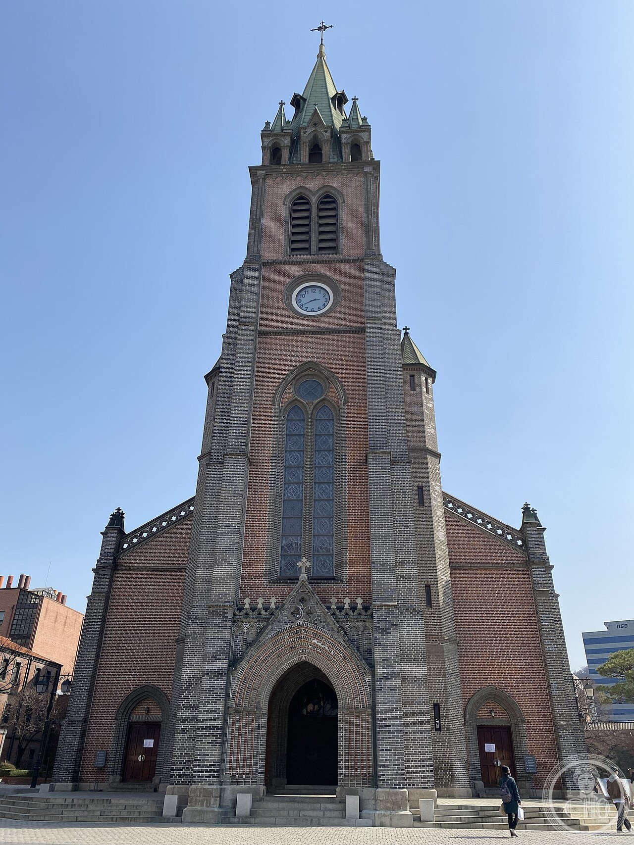 Myeongdong Cathedral in Seoul, South Korea, Korea's first Gothic Revival brick church, built 1892-1898 on a site linked to 18th-century Catholic converts and later a refuge for student protesters during the 1987 pro-democracy uprising