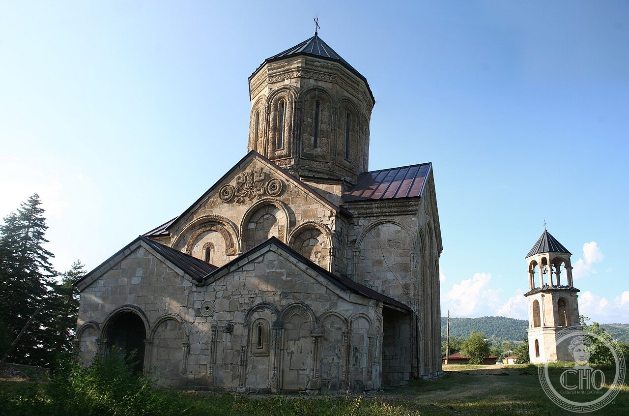Nikortsminda Cathedral in the Racha region of Georgia, built 1010-1014 under King Bagrat III, its facades covered in some of the finest and most elaborate stone relief carving in Georgian architecture