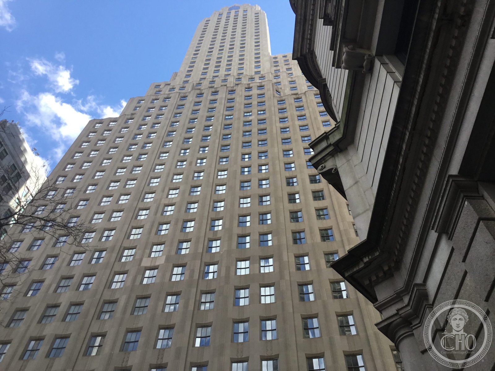 One Wall Street (Irving Trust Building) seen from Broadway, Lower Manhattan New York City — Art Deco 1931, Ralph Walker architect, pink brick Gothic tower