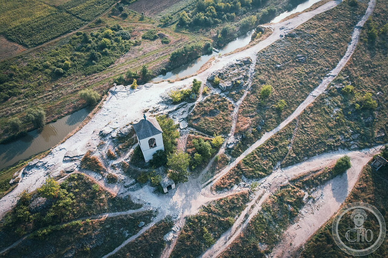 The cave monastery at Orheiul Vechi, Moldova, carved into limestone cliffs above the Răut River near Butuceni village, reactivated by Orthodox monks in 1996 after Moldovan independence