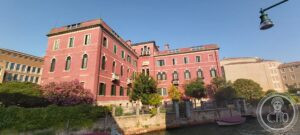 Red palazzo ai Tolentini, Venice — wide view from Fondamenta del Monastero