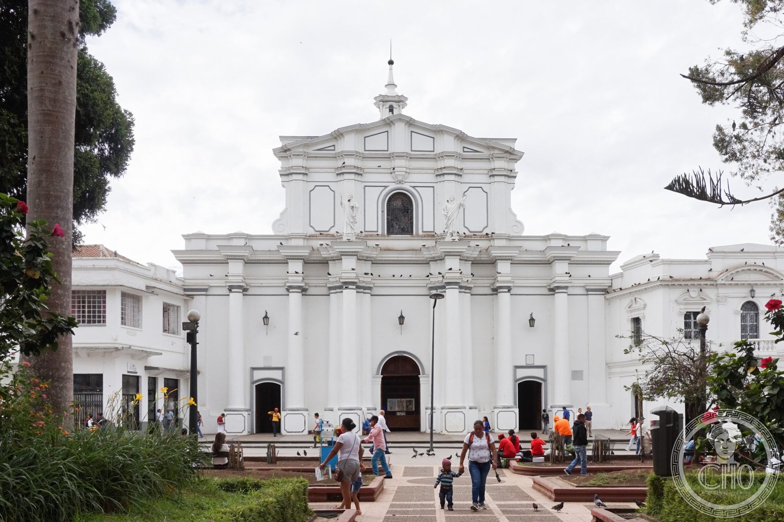 Cathedral of Our Lady of the Assumption in Popayán, Colombia, a white neoclassical facade with a dome, facing Parque Caldas