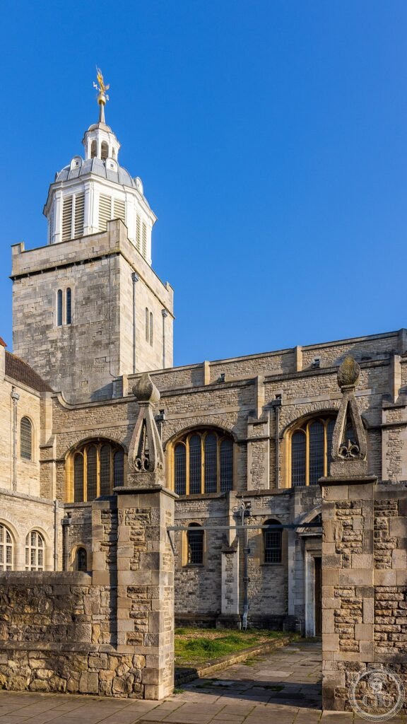 Portsmouth Cathedral seen from St Thomas's Street, showing its pale stone facade and tower