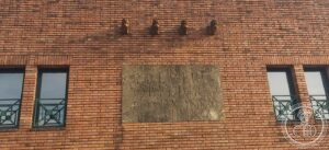Ex Casa del Fascio — Rubano (Quirino De Giorgio, 1937–1939) — The four fasces consoles and the slogan slab, set between the upper windows.