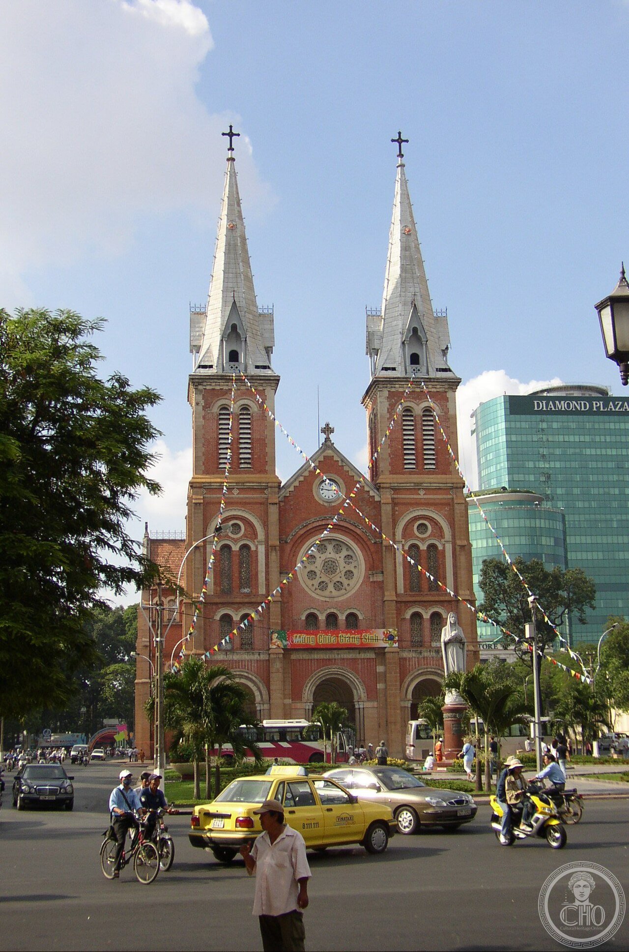 Notre-Dame Cathedral Basilica of Saigon in Ho Chi Minh City, Vietnam, built 1877-1880 entirely of materials imported from France, its Toulouse brick facade never painted or plastered and still showing its original rose-red color