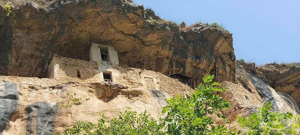View from the river of the Hermitage of San Bartolomeo in Legio, built into a rock face on the Majella mountain, Abruzzo, Italy, used by Pietro da Morrone, the future Pope Celestine V, around 1274