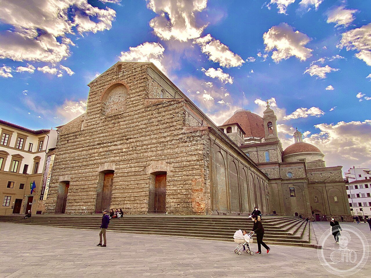 Unfinished bare-brick facade of the Basilica of San Lorenzo in Florence, Italy, redesigned by Brunelleschi from 1421 as the Medici family church, whose facade Michelangelo designed in 1518 but which was never built