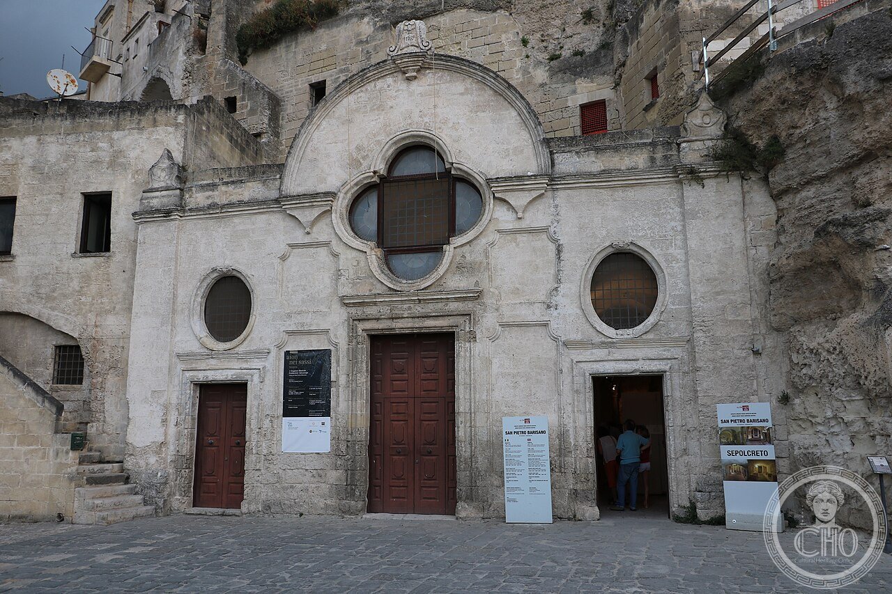 Facade of the rock-hewn church of San Pietro Barisano in the Sassi di Matera, Italy, the largest cave church in Matera, with its underground putridarium for draining the bodies of deceased priests