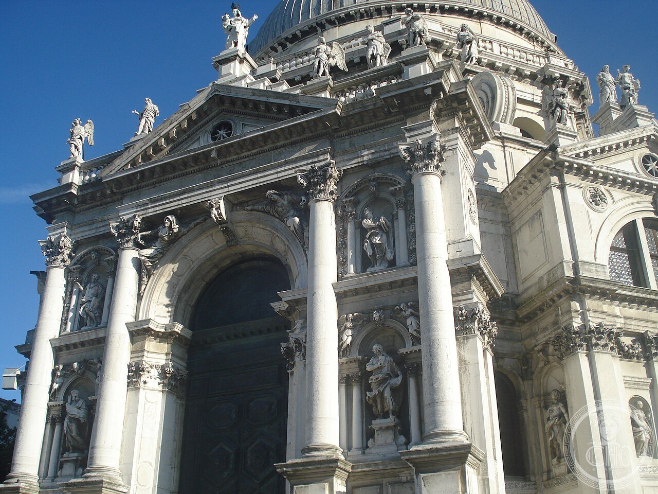 Exterior view of the Basilica of Santa Maria della Salute in Venice, Italy, with its distinctive octagonal dome, built 1631-1687 as a votive offering after the 1630 plague that killed a third of the city's population