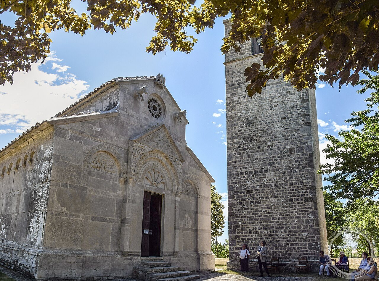 Facade and bell tower of the Romanesque church of Santa Maria della Strada near Matrice, Molise, Italy, consecrated 1148, famous for its extensive carved bestiary of animals and figures including the Flight of Alexander the Great