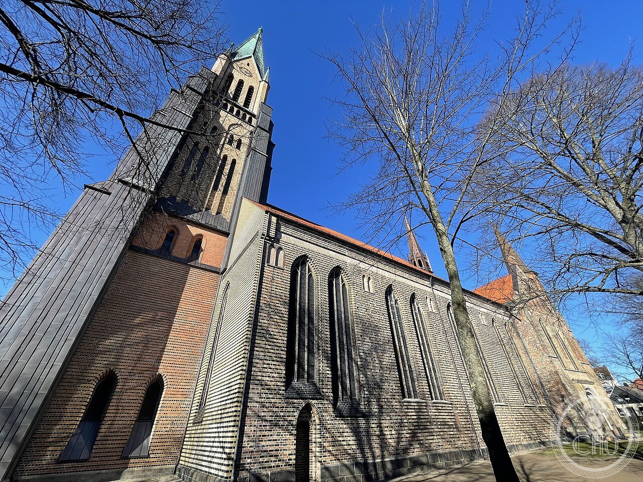 Exterior of Schleswig Cathedral, Germany, a Gothic brick church founded 947, housing the 12.6-metre Bordesholm Altarpiece carved by Hans Brüggemann between 1514 and 1521