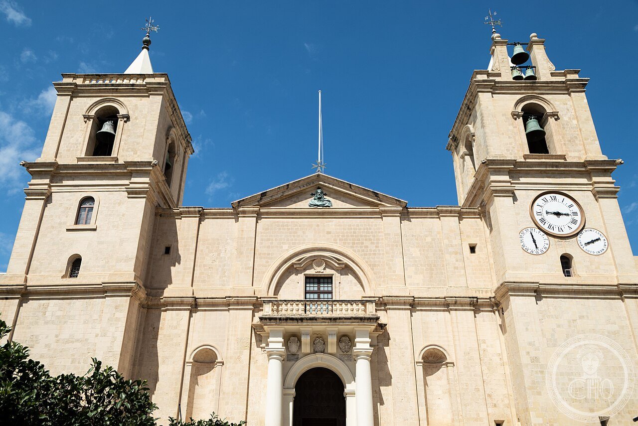 St John's Co-Cathedral in Valletta, Malta, built 1573-1578 for the Knights Hospitaller, with a plain fortified facade hiding a lavish Baroque interior and Caravaggio's only signed painting