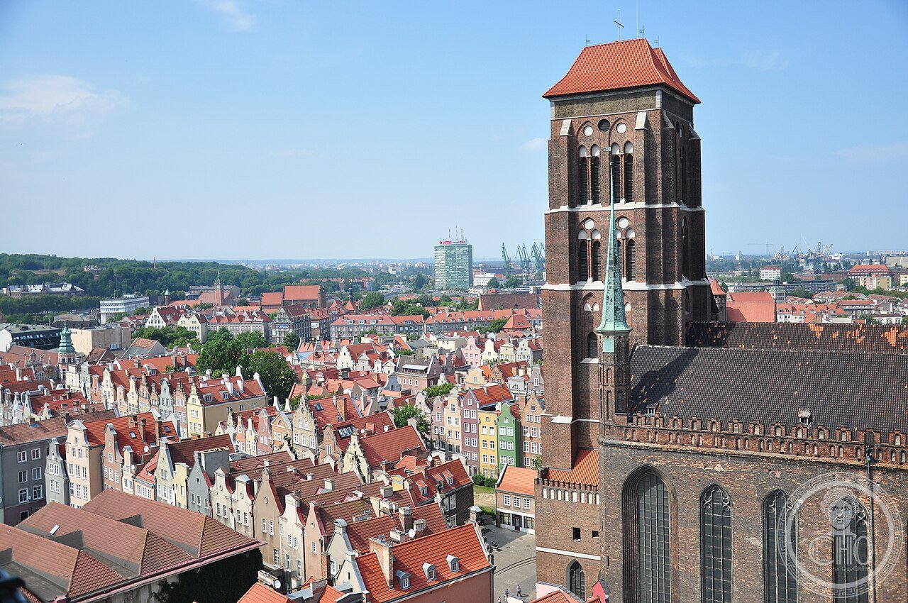 St Mary's Basilica in Gdańsk, Poland, the largest brick church in the world, built 1343-1502, home to a 15th-century astronomical clock nearly 14 metres tall whose figures of Adam, Eve, and Death still perform at noon