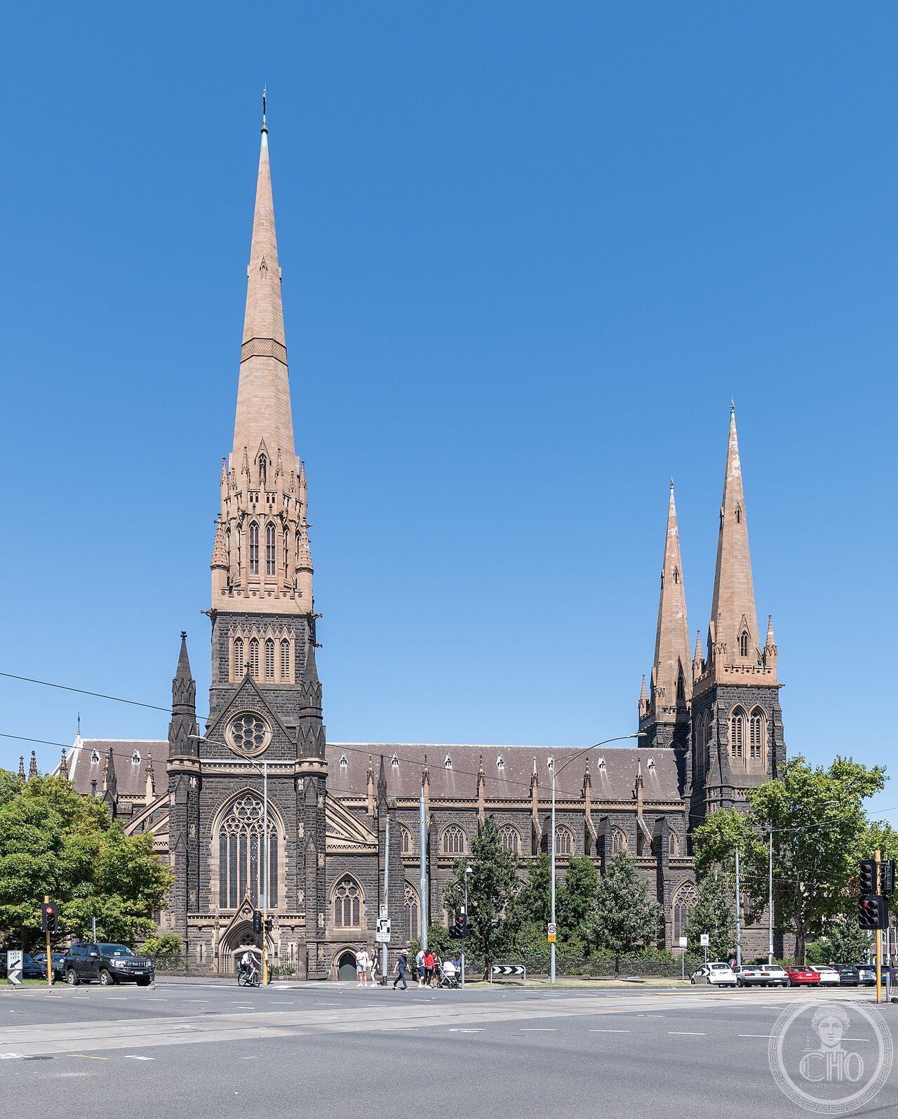 St Patrick's Cathedral in Melbourne, Australia, a Gothic Revival bluestone cathedral designed by William Wardell, its 105-metre central spire completed only in 1939, 79 years after the foundation stone
