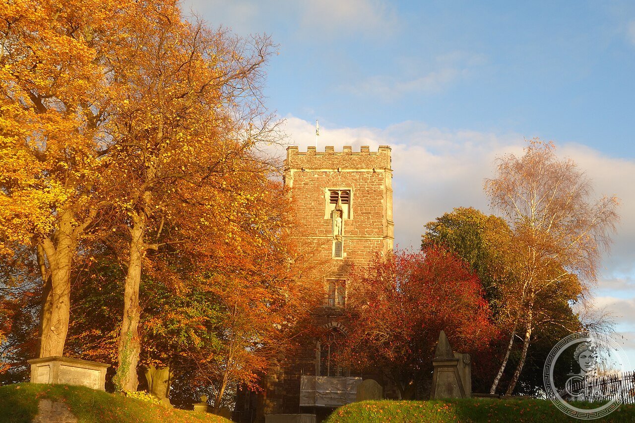 Newport Cathedral (St Woolos) in Wales, founded by the 5th-century warlord-turned-saint Gwynllyw who built his church wherever he found a white ox with a black spot, its Norman arch resting on Roman columns from the legionary fort at Caerleon